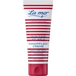 Eine Tube Handcreme mit rot-weißen Streifen und blauer Schrift darauf.
